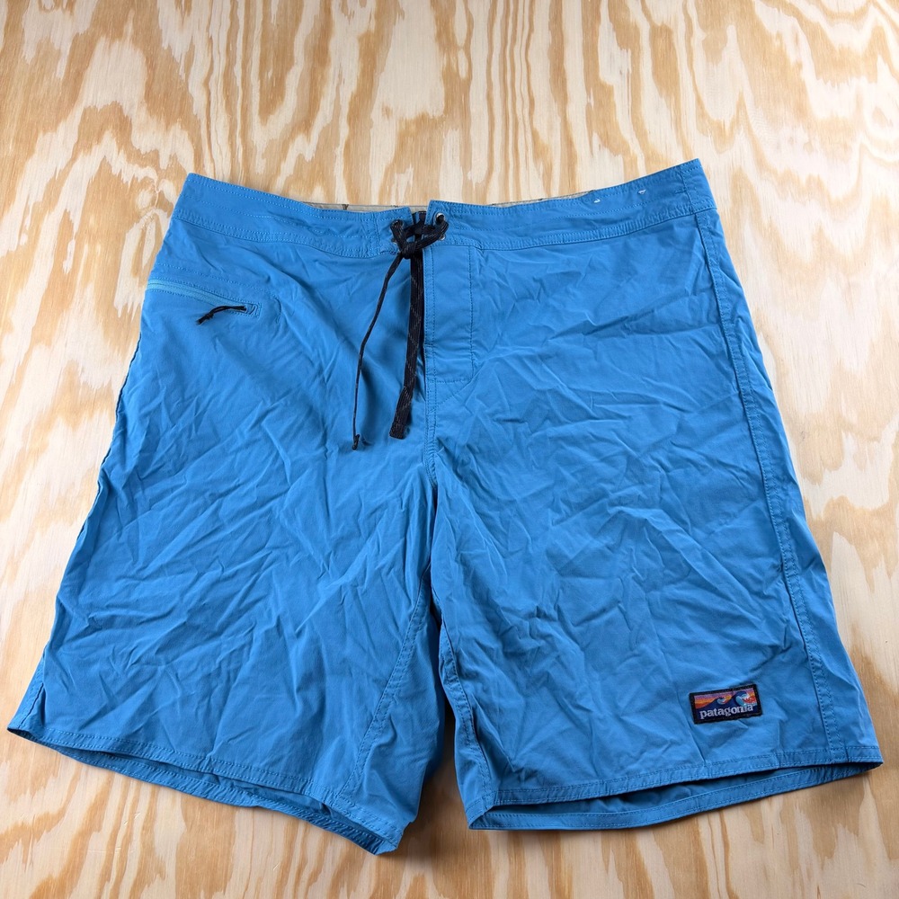 Patagonia Mens Blue Board Shorts Swim Trunks Size 38 Wave Logo Zipper Pocket
